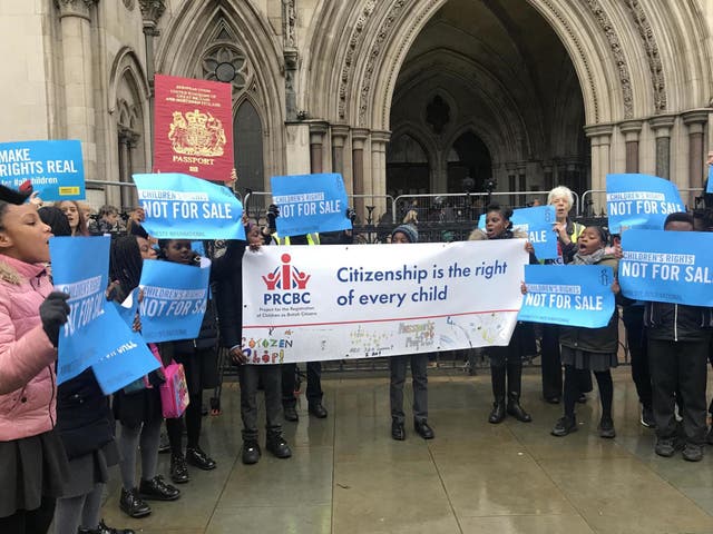 Children affected by the fee chant 'children's rights, not for sale' outside High Court ahead of the hearing on Tuesday morning