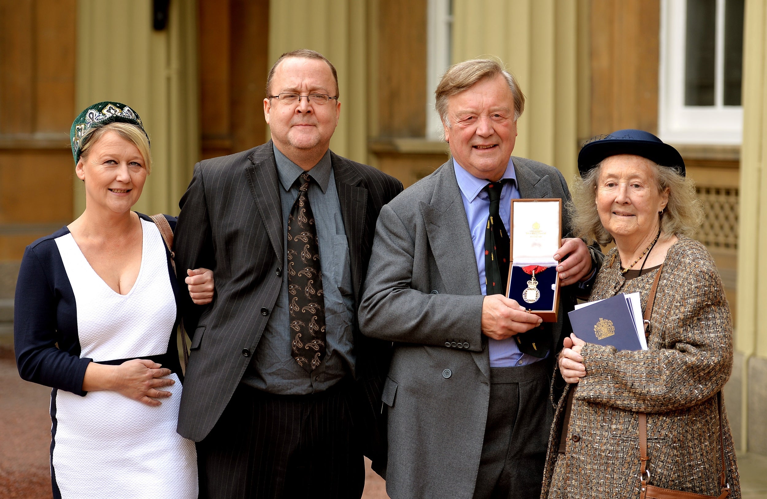 Clarke and his family at Buckingham Palace in 2014