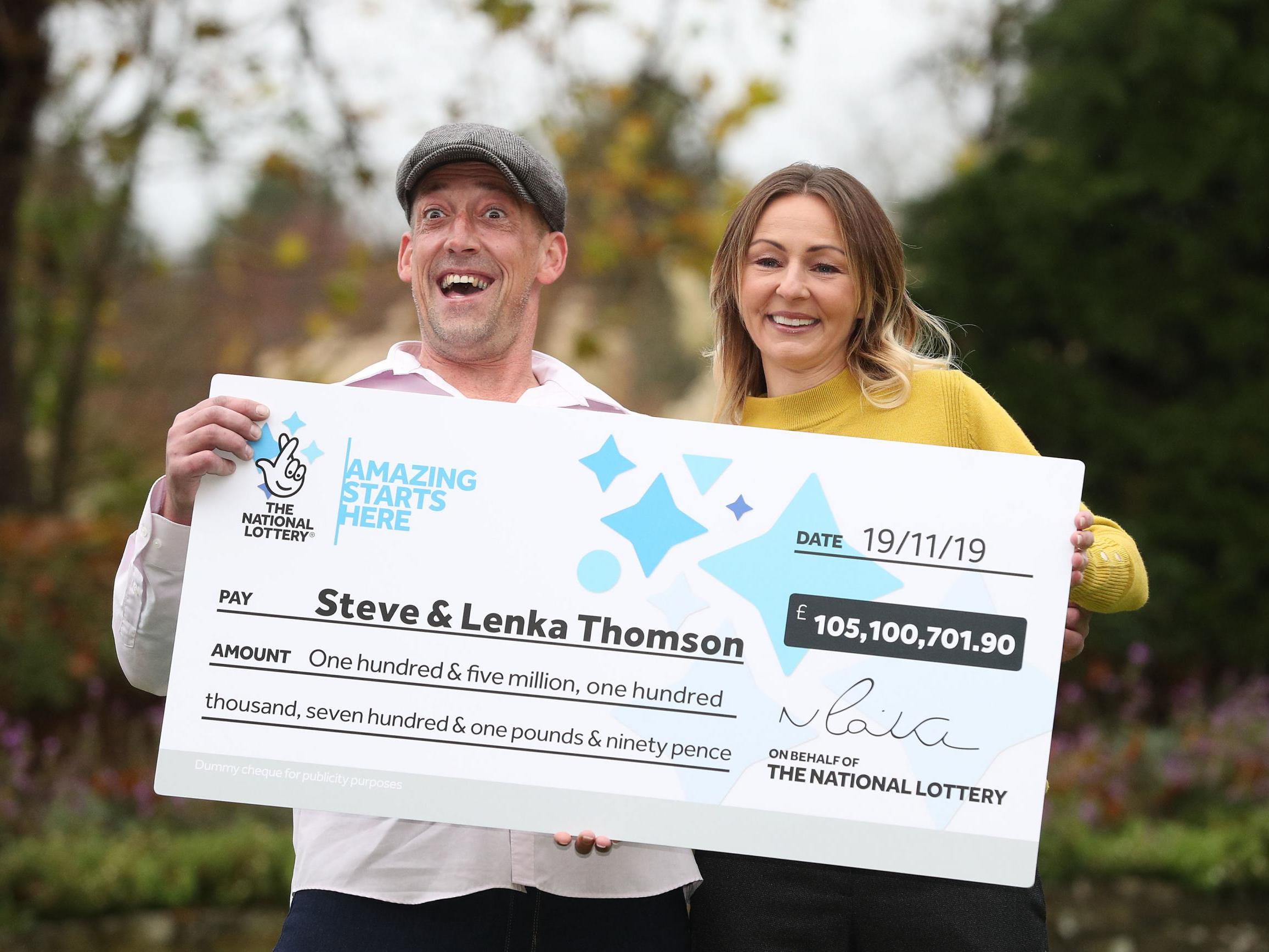 Self-employed builder Steve Thomson, 42, and his wife Lenka Thomson, 41, from Selsey, West Sussex, celebrate their win