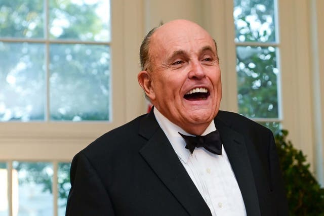 Mr Giuliani pictured at a State Dinner in the White House in September