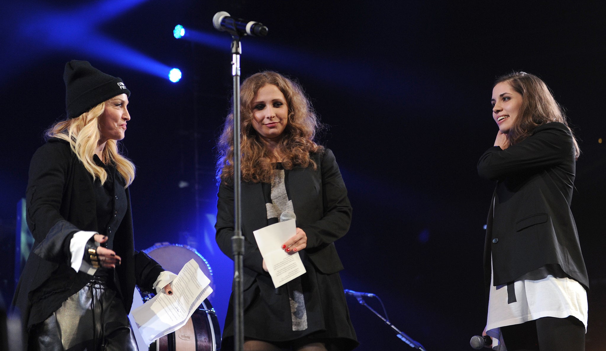 Madonna introduces Alyokhina and Tolokonnikova to speak onstage at the Amnesty International concert in New York in 2014