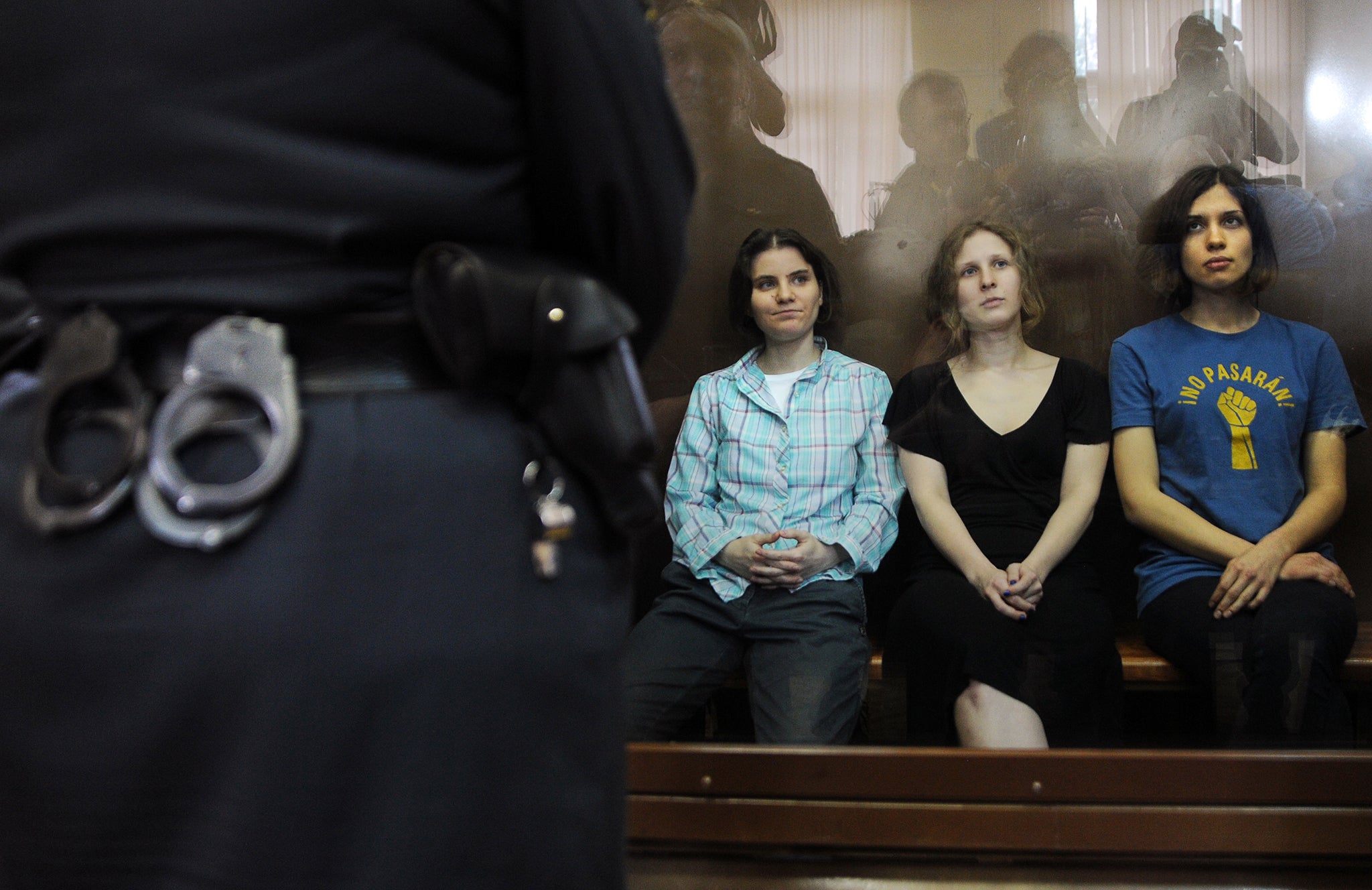 Tolokonnikova, Alyokhina and Samutsevich during their sentencing hearing in Moscow in August 2012. They were given two years of jail time for hooliganism