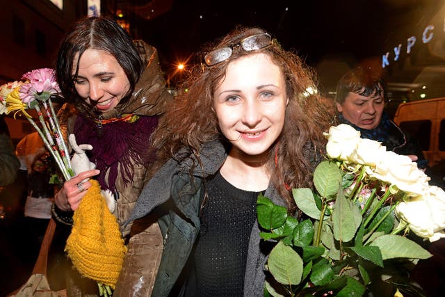 <p>Maria Alyokhina (C), one of the jailed members of anti-Kremlin punk band Pussy Riot</p>