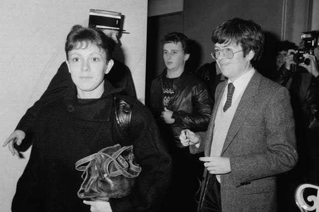 Grégory Villemin's parents, Christine Villemin (left) and Jean-Marie Villemin (foreground), arrive at the office of Judge Lambert (right) in Epinal for a confrontation with witnesses on 22 November, 1984.