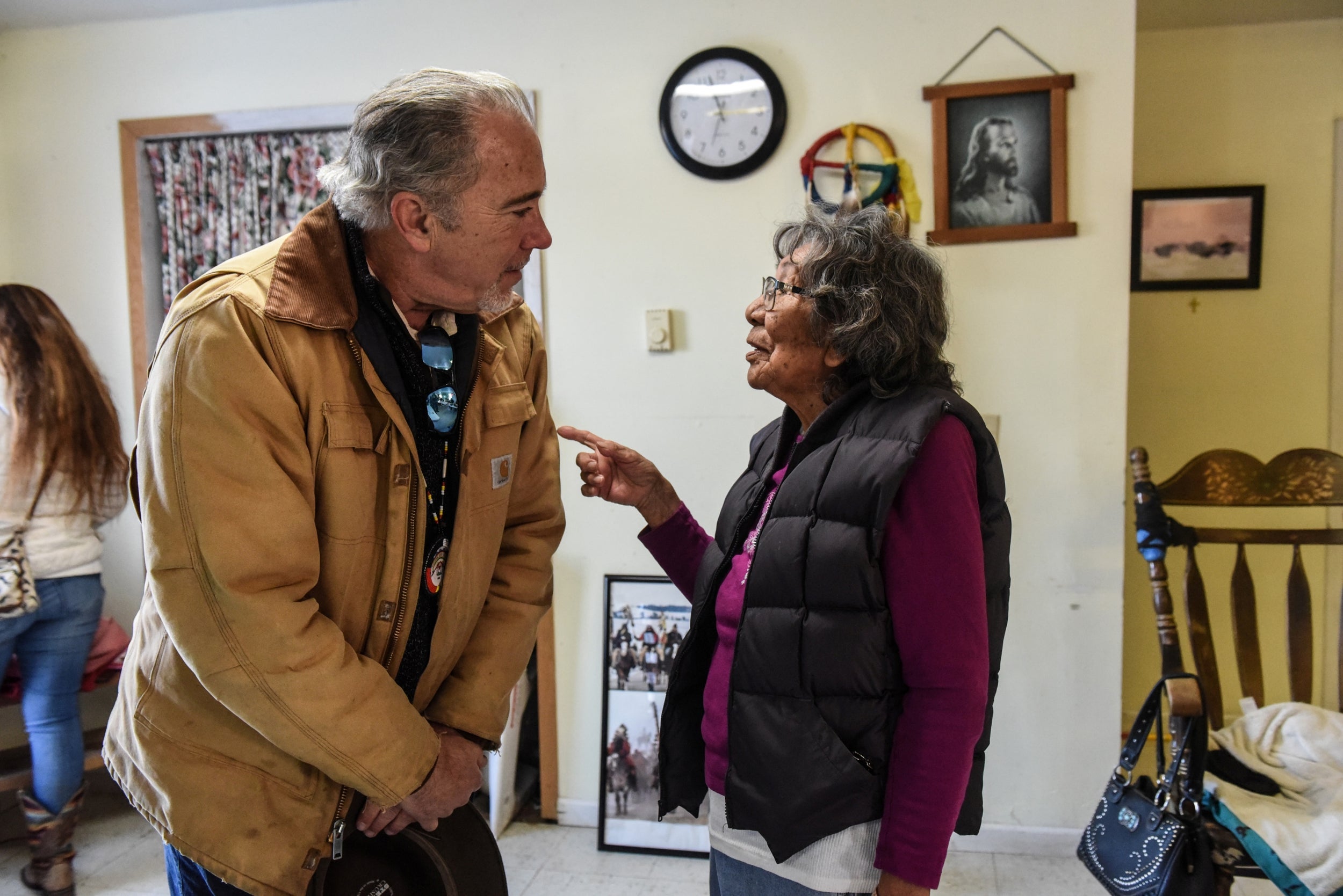 Brad Upton, a descendant of the commander of the US troops who carried out the Wounded Knee massacre in South Dakota in 1890, meets Debbie Day, a relative of one of the Lakota victims, on a reservation in Bridger in November 2019 to formally apologise for his ancestor's part in the massacre
