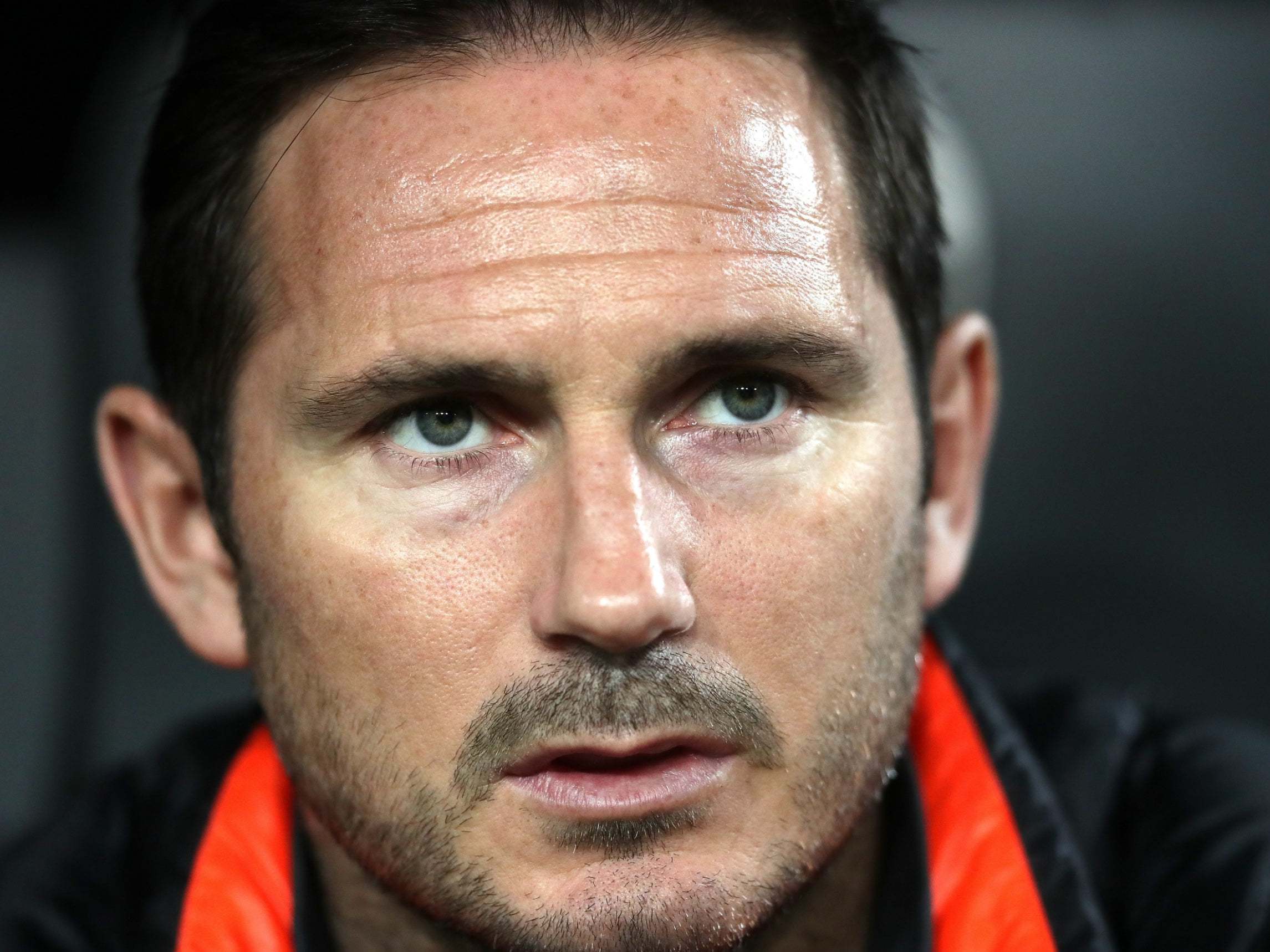 Frank Lampard watches on from the touchline