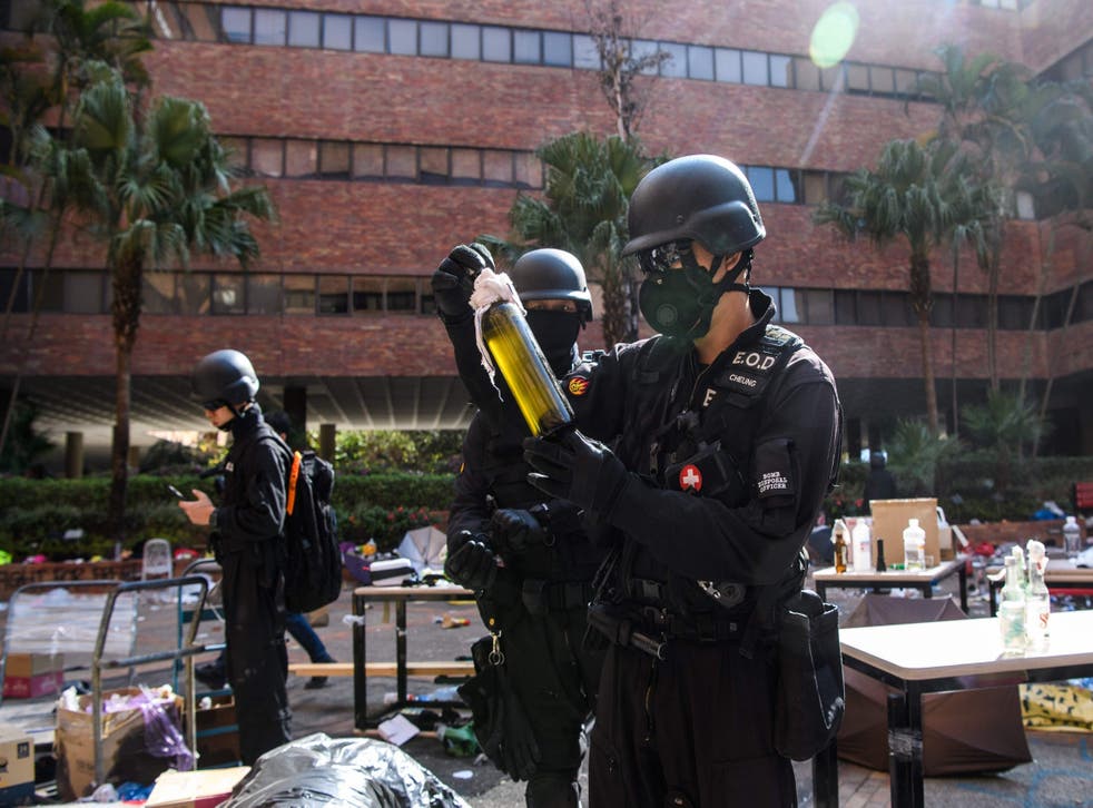 As China reacted angrily to the US legislation, Hong Kong police personnel entered the Hong Kong Polytechnic University campus to clear out caches of incendiary weapons and assess the damage to facilities