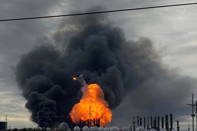 Flames are seen after a massive explosion that sparked a blaze at a?Texas petrochemical plant