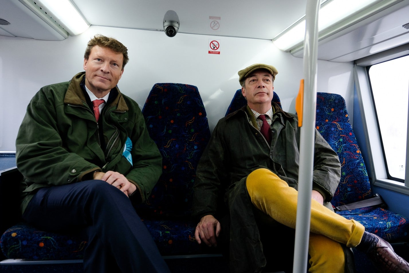 Nigel Farage and Richard Tice ride in the Brexit Party campaign bus during a general election visit to Hartlepool