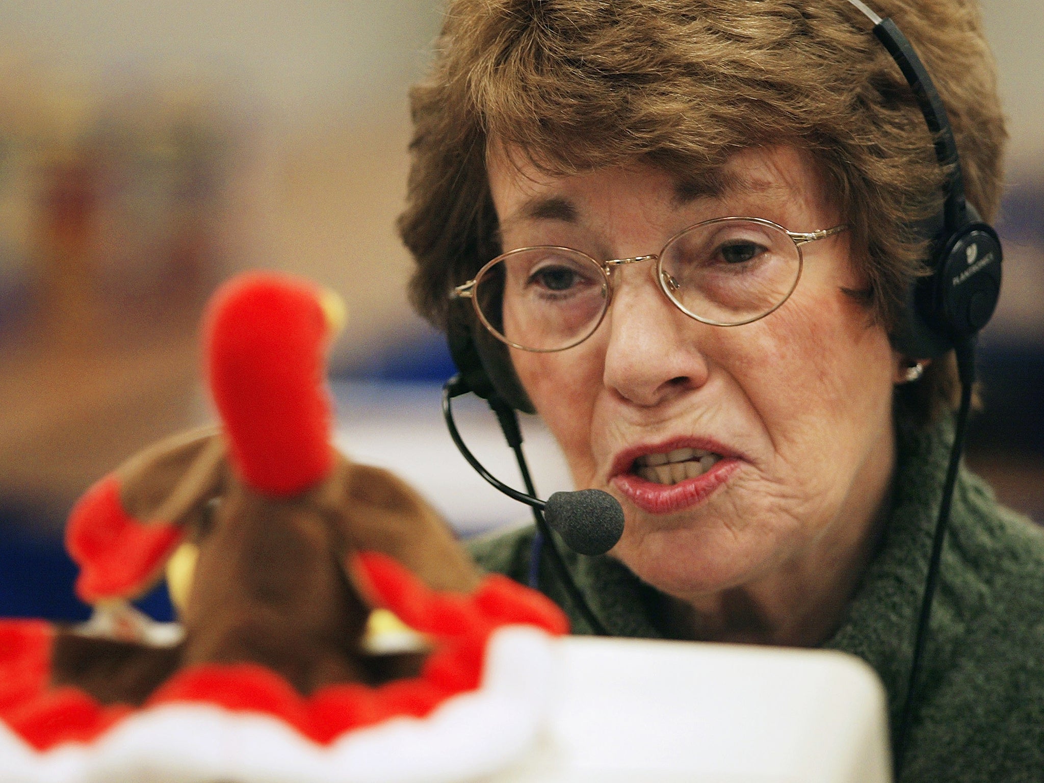 Veteran June Rollins assists a caller with their turkey-related query