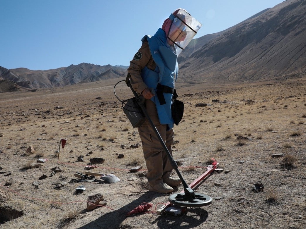 One of the female de-miners working in a minefield in Bamyan