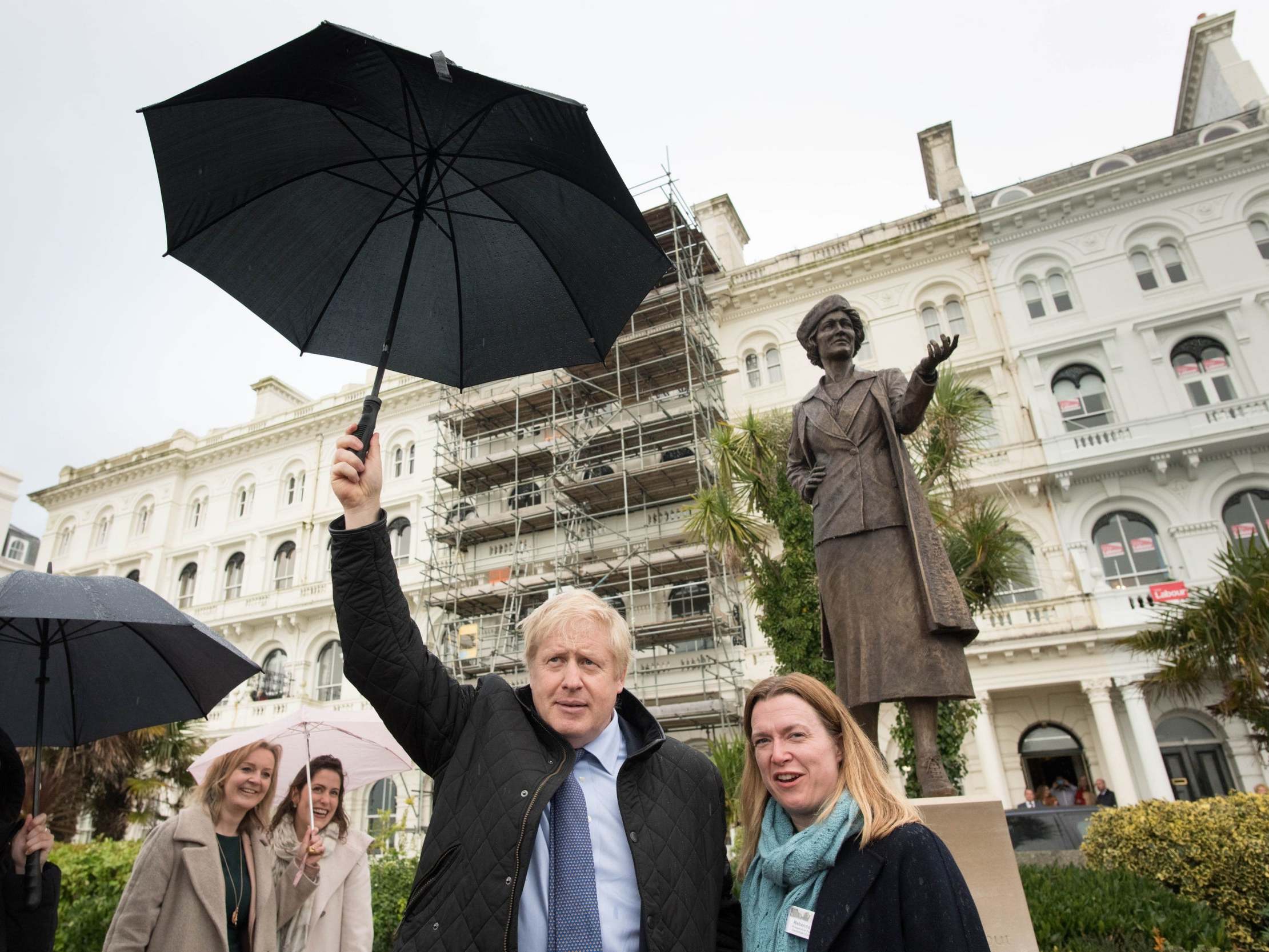 Boris Johnson and Plymouth parliamentary candidate, Rebecca Smith look at a statue of Nancy Astor, the first female MP to sit in parliament