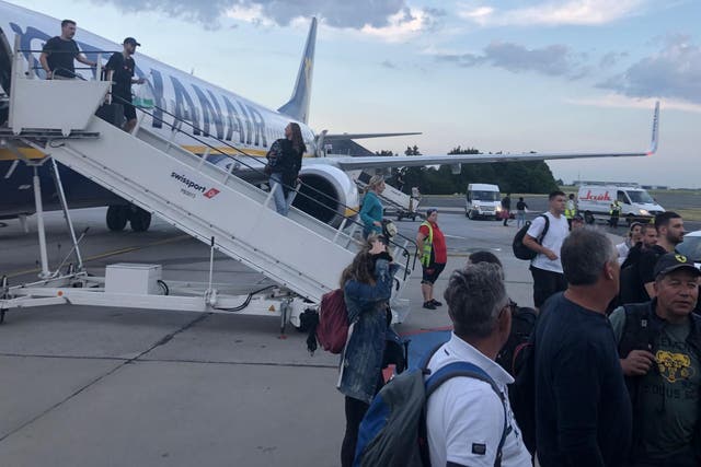 Safe ground: Ryanair passengers at Schoenefeld airport in Berlin