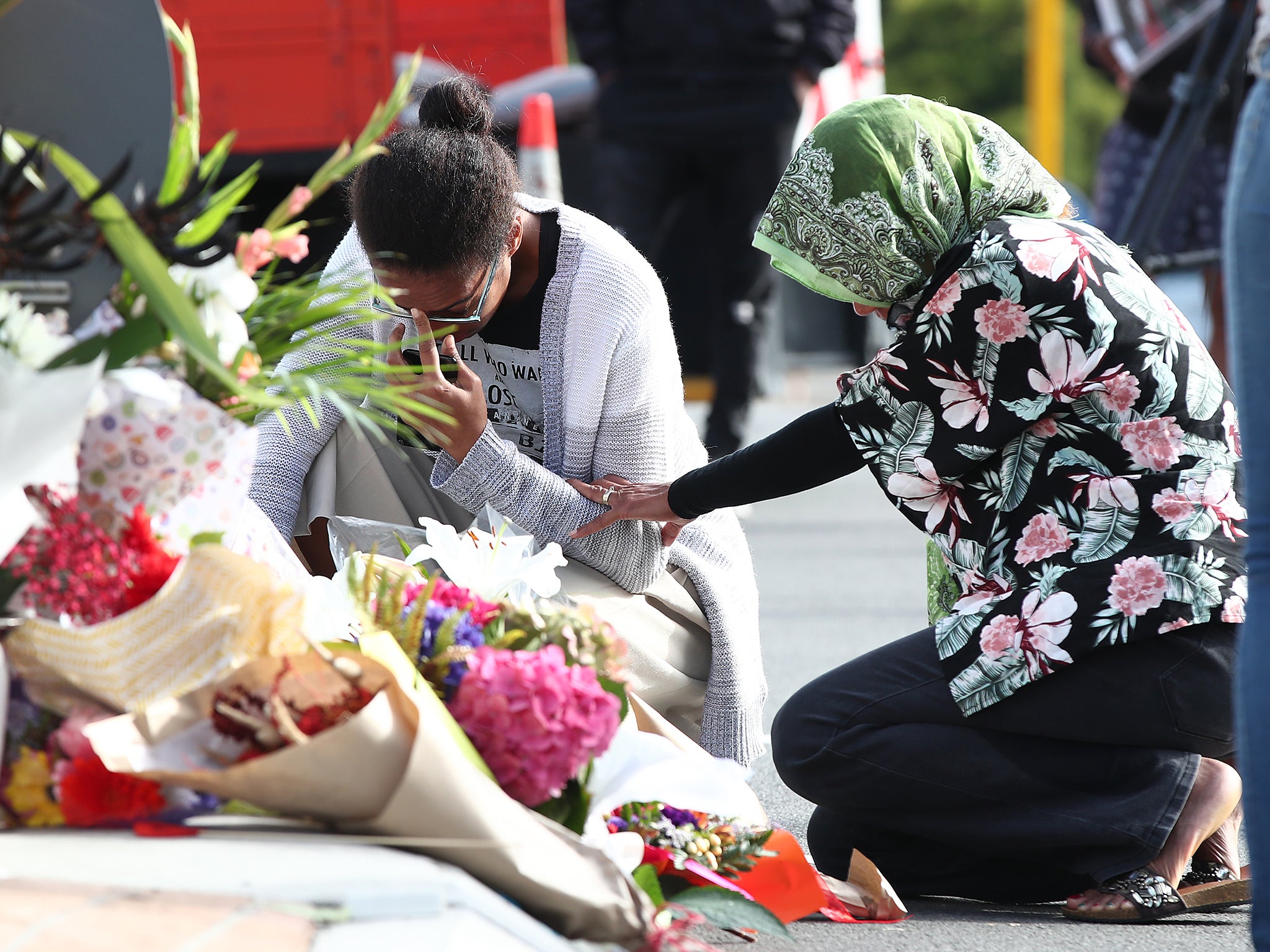 Mourners outside Christchurch following the Islamaphobic mass shooting in March 2019