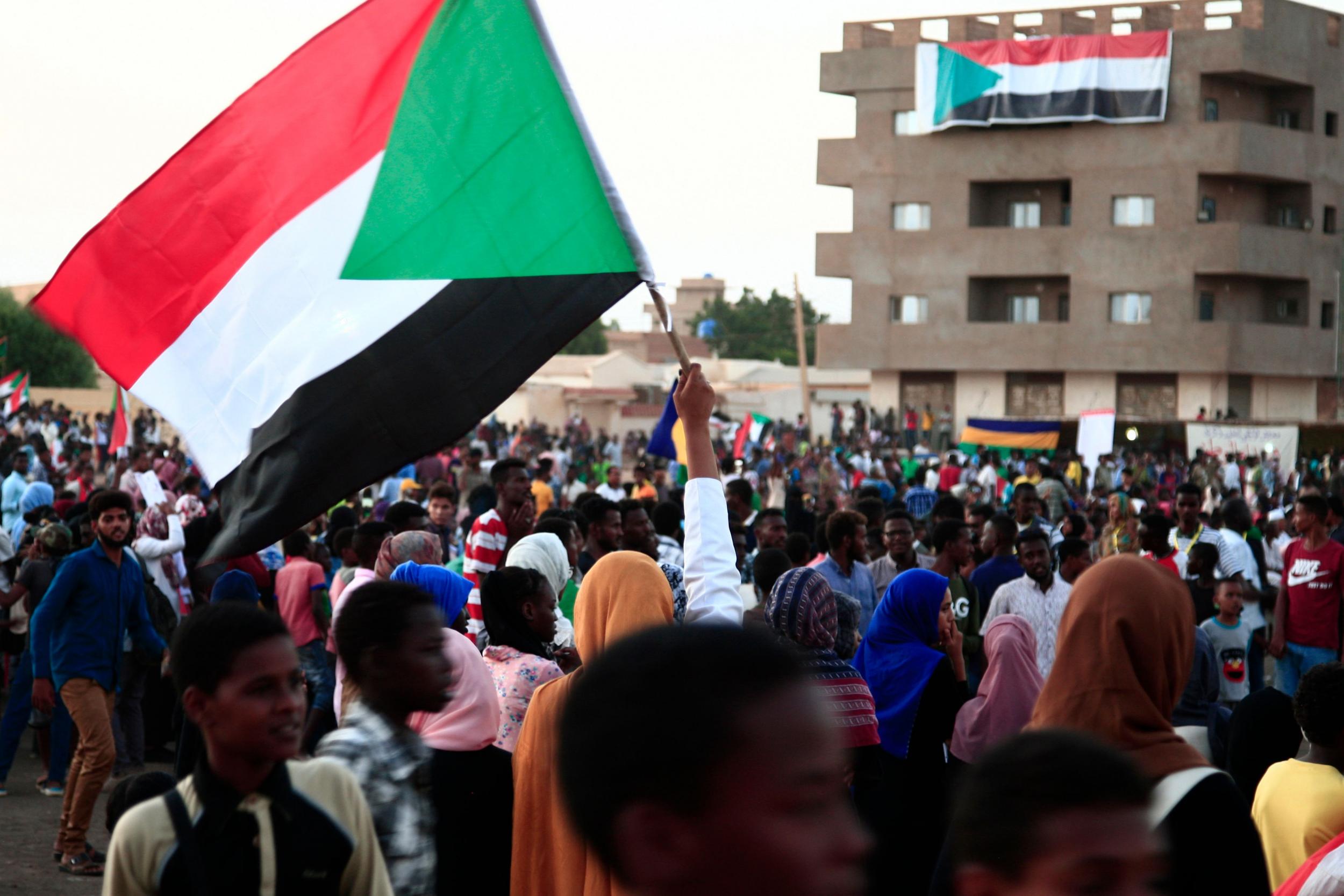 Sudanese demonstrators march during a protest in Bahri, the capital Khartoum’s northern district, in October (AFP via Getty)