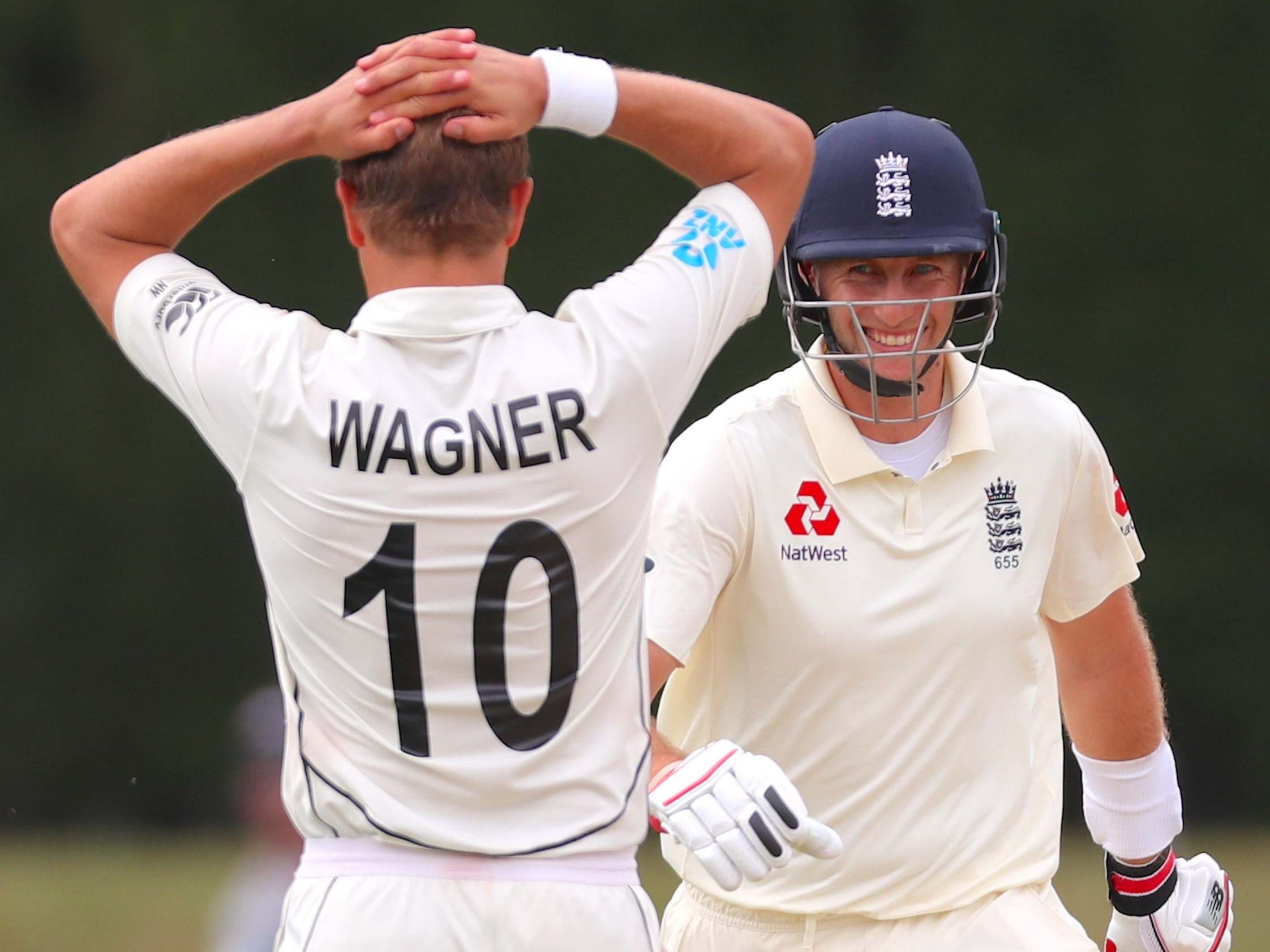 Joe Root celebrates after reaching his century