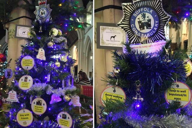The tree, which is decorated with safety advice, is part of a church festival