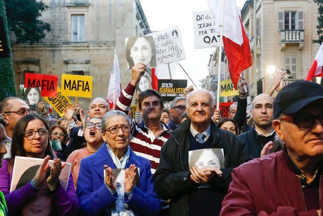 Ms Caruana Galizia's parents, Rose and Michael Vella,at the protest calling for justice