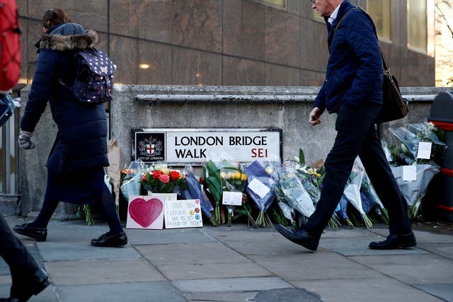 Flowers and messages are left at the scene of last November’s terror attack on London Bridge