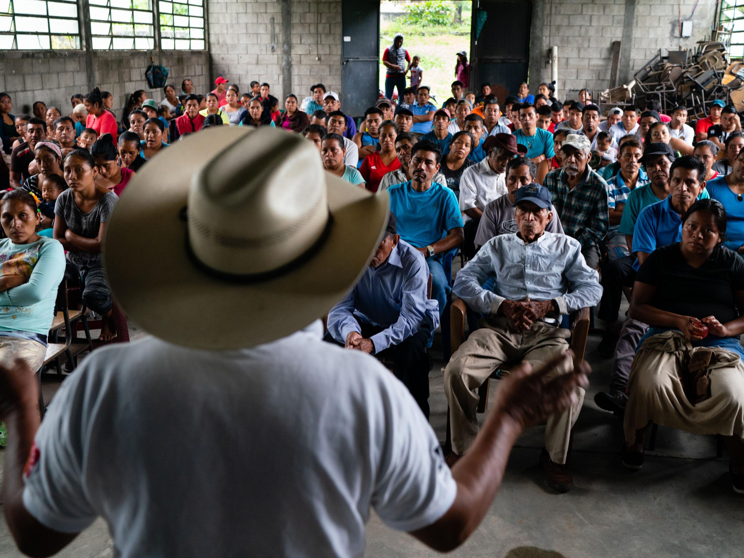 Carlos Montejo Lopez leads a community meeting to discuss the future (The Washington Post)