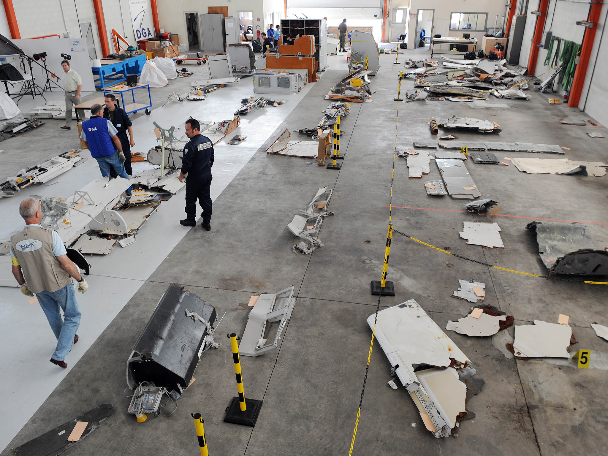 French investigators inspect debris from the mid-Atlantic crash of Air France flight 447 in July 2009