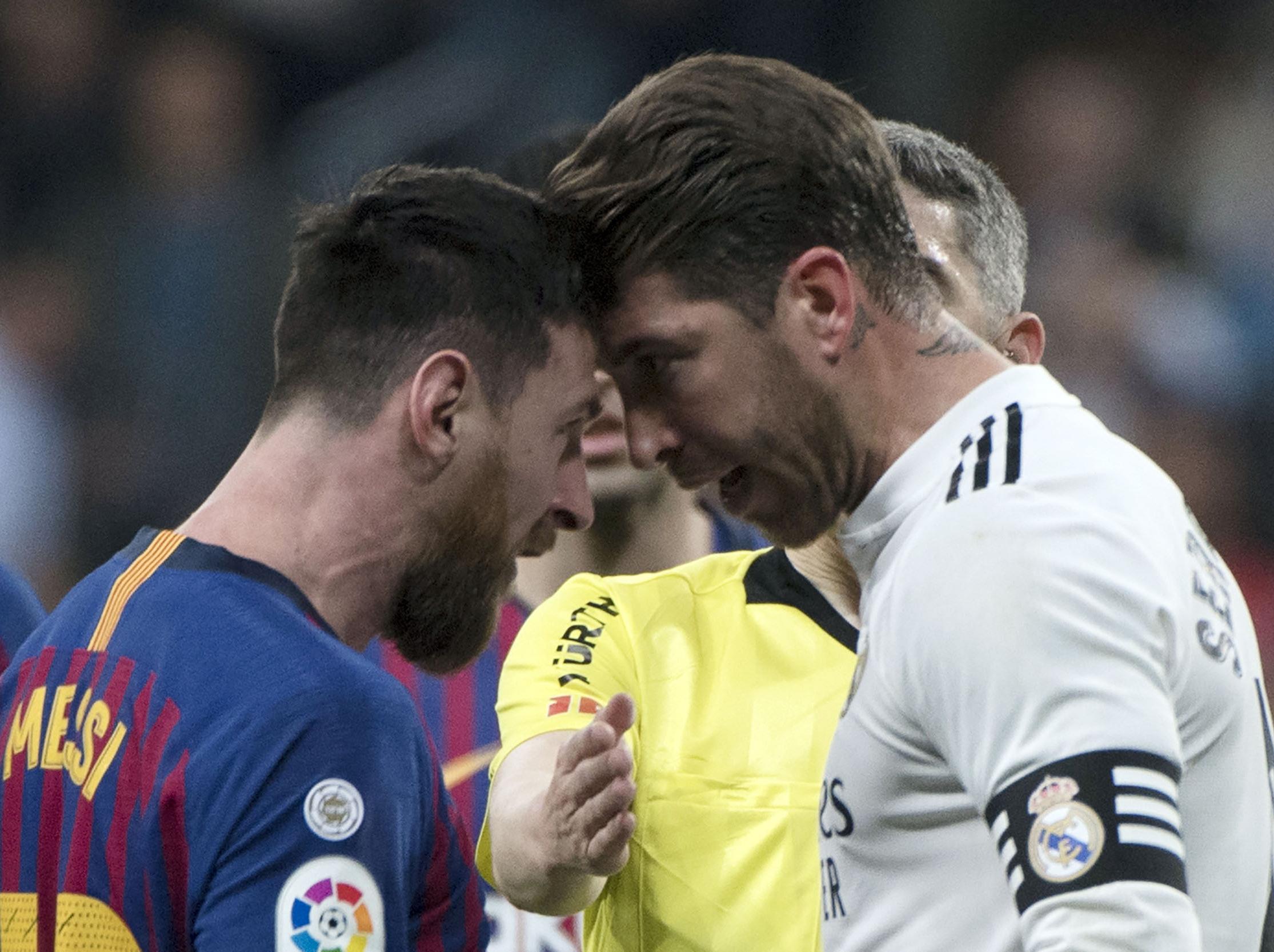 Lionel Messi and Sergio Ramos go head to head in a heated Clasico