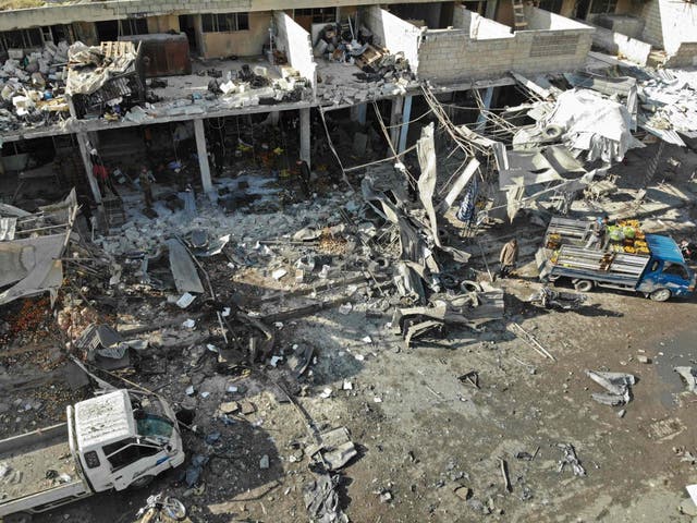 An aerial view shows the destruction following a regime air strike on December 2, 2019 in a market in the town of Maaret al-Numan, Idlib