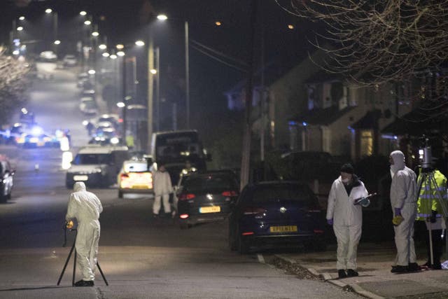 Forensic Officers in Willingdale Road near Debden Park High School, in Loughton, Essex, after the murder investigation was launched