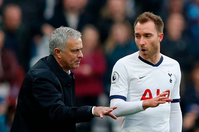 Tottenham Hotspur's Jose Mourinho instructs Christian Eriksen