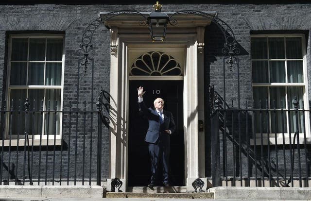 <p>Boris Johnson on the threshold of No 10 when he became prime minister in 2019 </p>