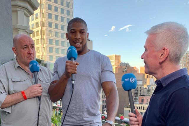 Steve Bunce and Mike Costello with Anthony Joshua in May of this year