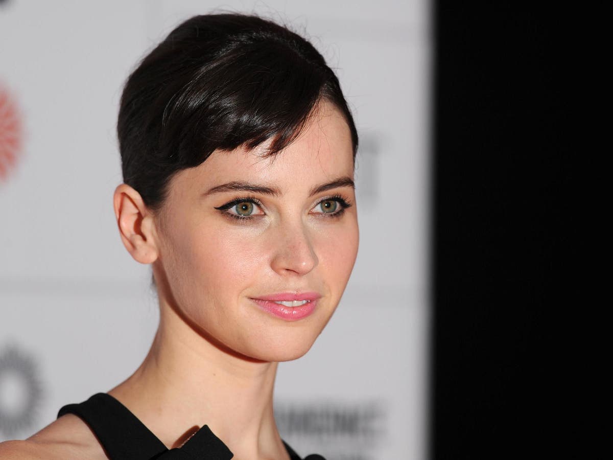 Felicity Jones is pregnant with her first child with husband Charles Guard