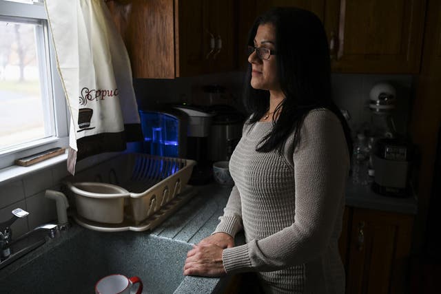 Sandra Diaz, a former employee of the Trump National Golf Club Bedminster and an undocumented migrant, at her home in Bound Brook, New Jersey