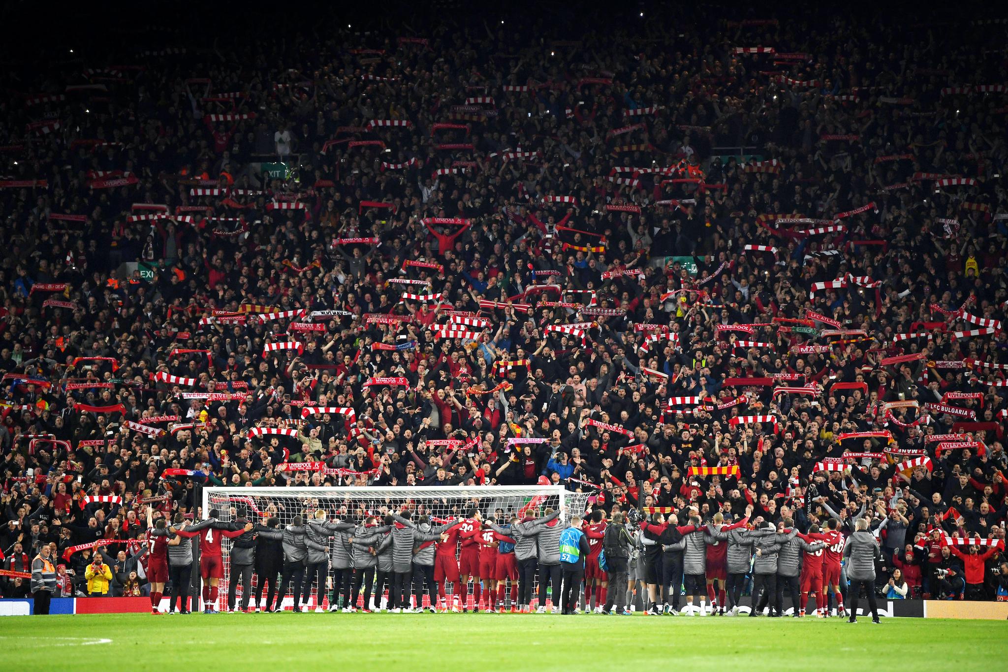 Liverpool players celebrate with fans after the UEFA Champions League Semi Final second leg match between Liverpool and Barcelona at Anfield