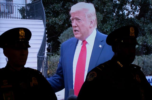 Donald Trump is seen on a screen during an impeachment hearing held at the House Judiciary Committee