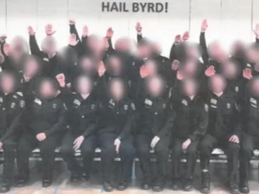Staff fired after 30 US corrections officers photographed giving Nazi salute