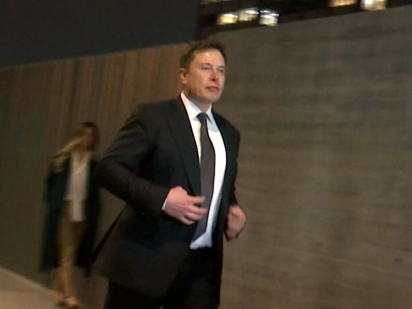 Tesla CEO Elon Musk leaves court on Tuesday 3 December 2019, in Los Angeles