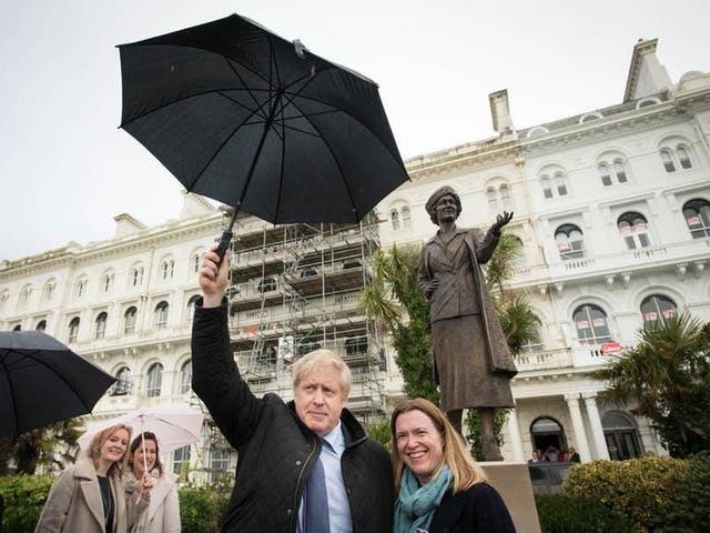 Boris Johnson and Plymouth parliamentary candidate Rebecca Smith in front of a statue of Nancy Astor
