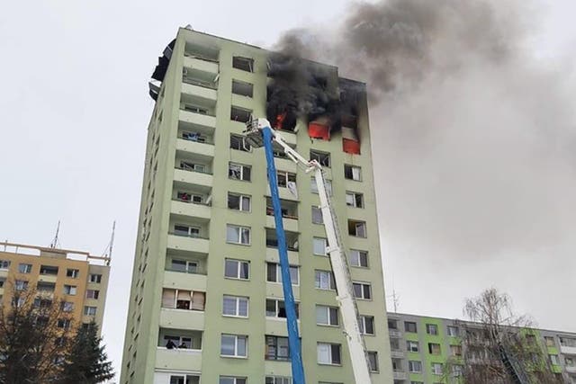 Residents have been evacuated while some people remain trapped on the roof