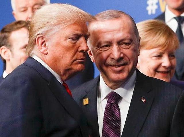 At a White House meeting, Turkish President Erdogan said a resolution condemning the Armenian genocide would "cast a deep show" over the countries' relations.