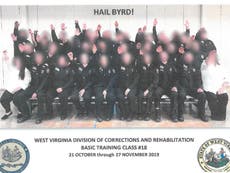 US prison staff pictured doing Nazi salute