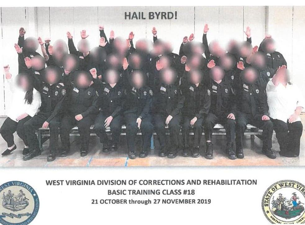 Three prison employees fired over Nazi salute photo, while 34 have been suspended