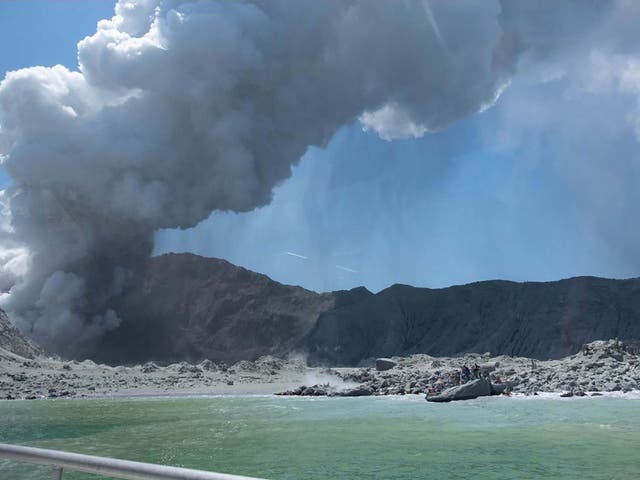 New Zealand's White Island spewing steam and ash minutes after an eruption
