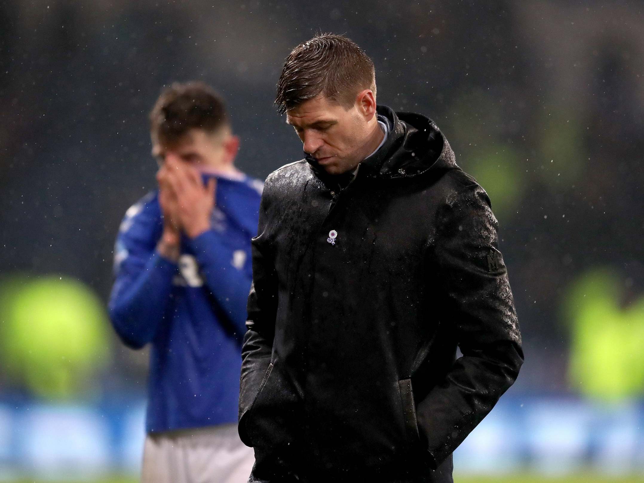 Steven Gerrard cuts a dejected figure at full time