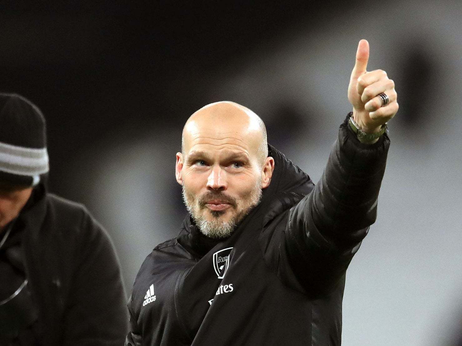 Ljungberg salutes the Arsenal fans at the London Stadium after the win over West Ham