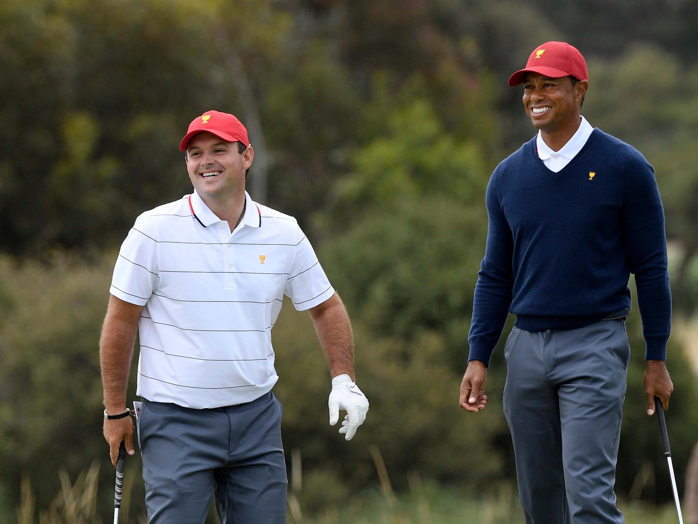 Tiger Woods and Patrick Reed play a practice round for the Presidents Cup