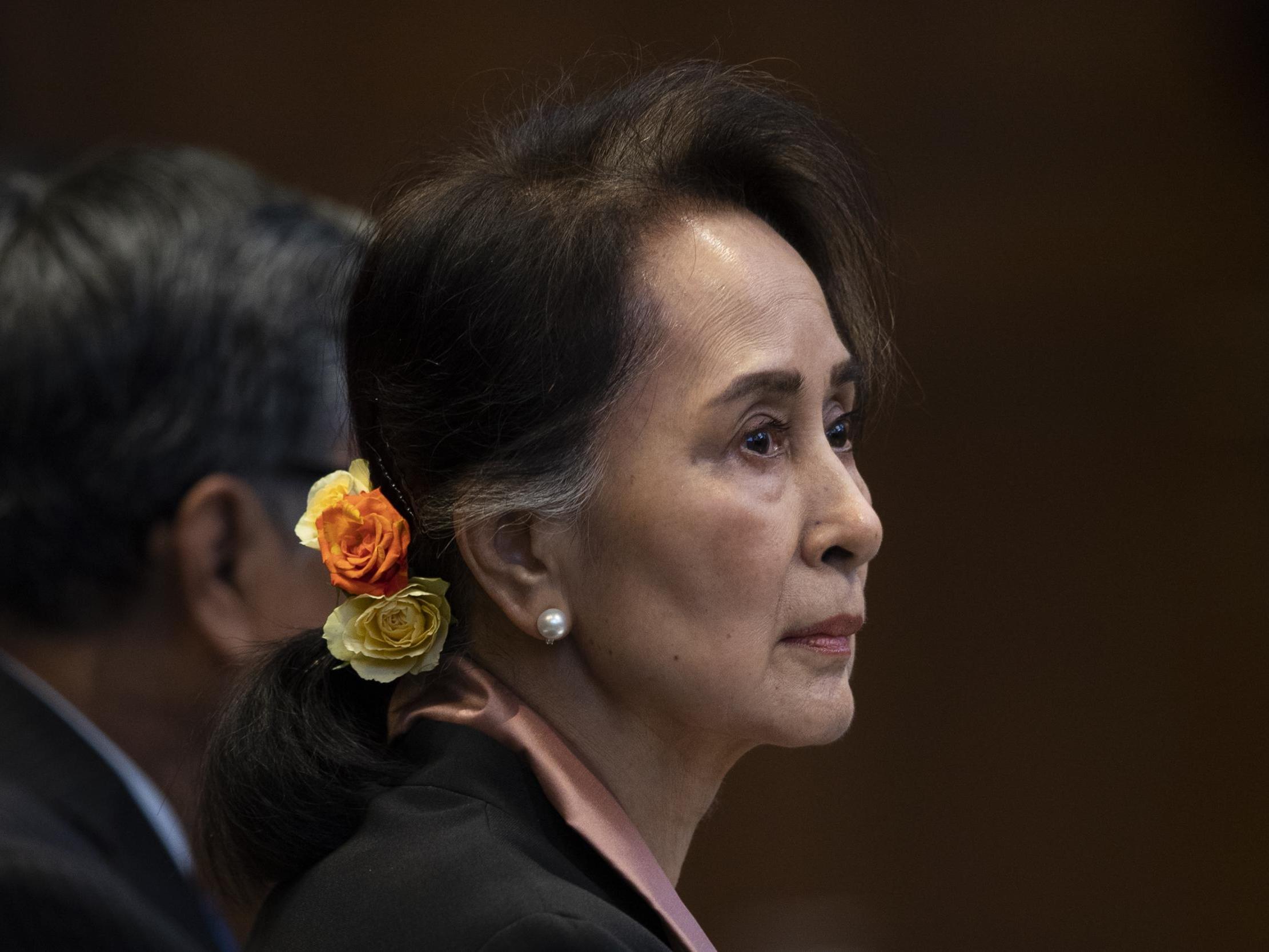 Aung San Suu Kyi appears in court over Myanmar genocide charges on 28th anniversary of Nobel Peace Prize