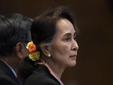 Aung San Suu Kyi appears in court over Myanmar genocide charges