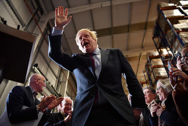 British Prime Minister and Conservative leader Boris Johnson arrives to speak at a general election campaign rally