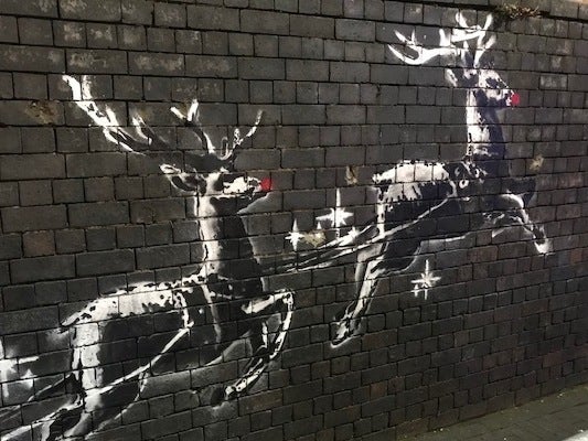 Banksy: Mysterious street artist's new mural highlighting